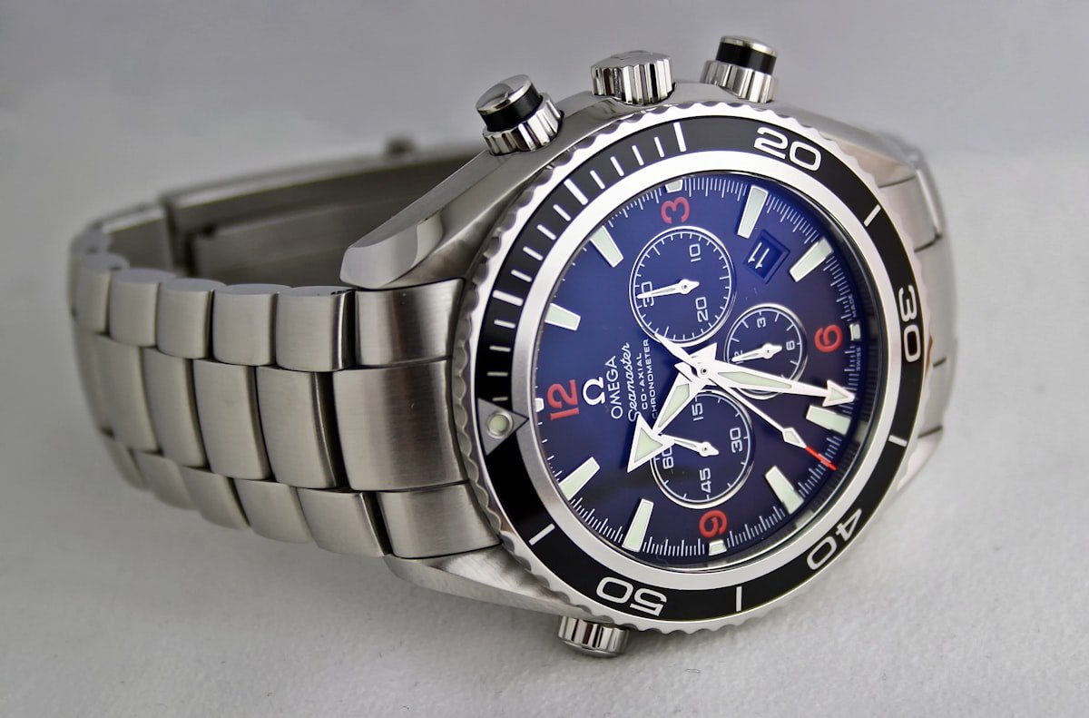 Watch with grey NATO strap close-up on wrist